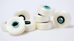 Filtec Magna-Glide Style L White Polyester Bobbins - 135 yards per bobbin